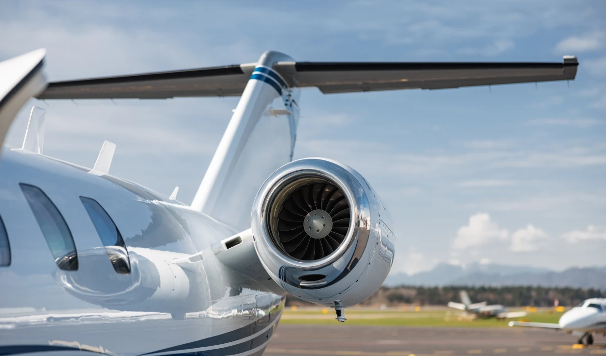 Aircraft parked on runway, scenic view